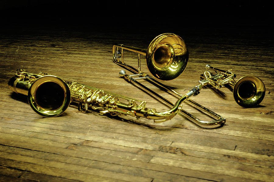 Some horns: a trumpet, trombone, and tenor saxophone